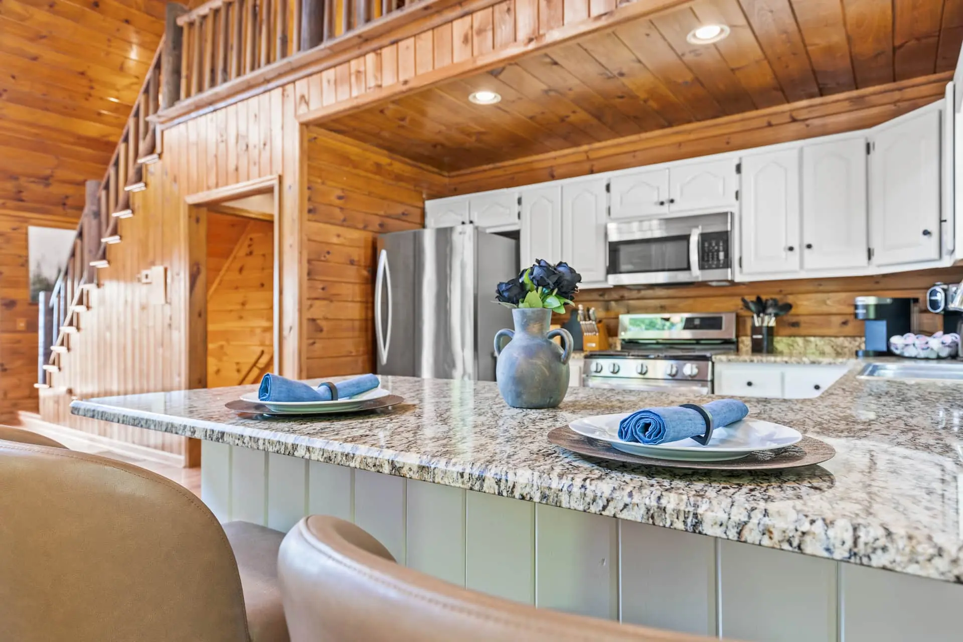 Pull up a seat at the kitchen peninsula—the perfect spot for morning coffee, casual meals, or planning the day’s adventures.